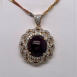 Ruby and white sapphire necklace in sterling silver. Appraised value:$2050